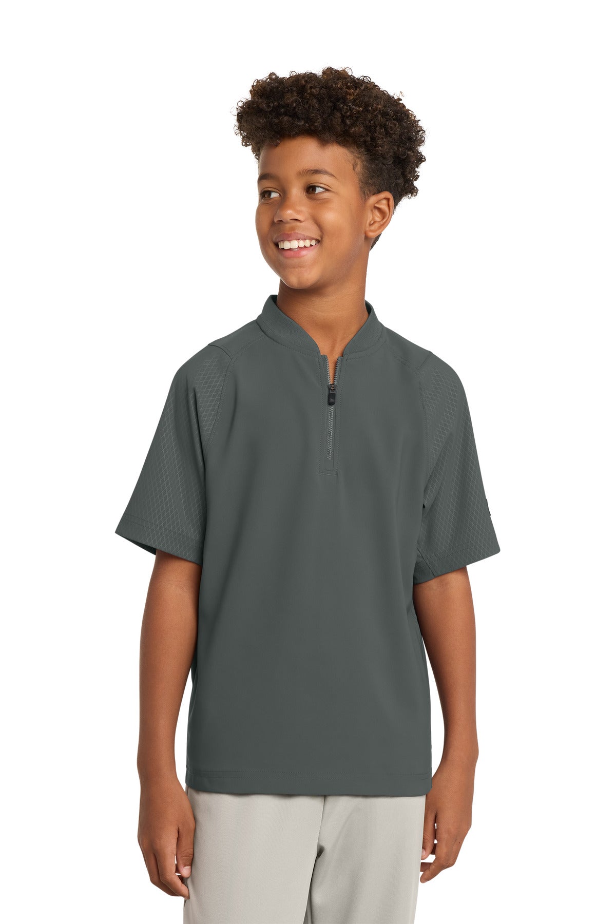 New Era Â® Youth Cage Short Sleeve 1/4-Zip Jacket. YNEA600